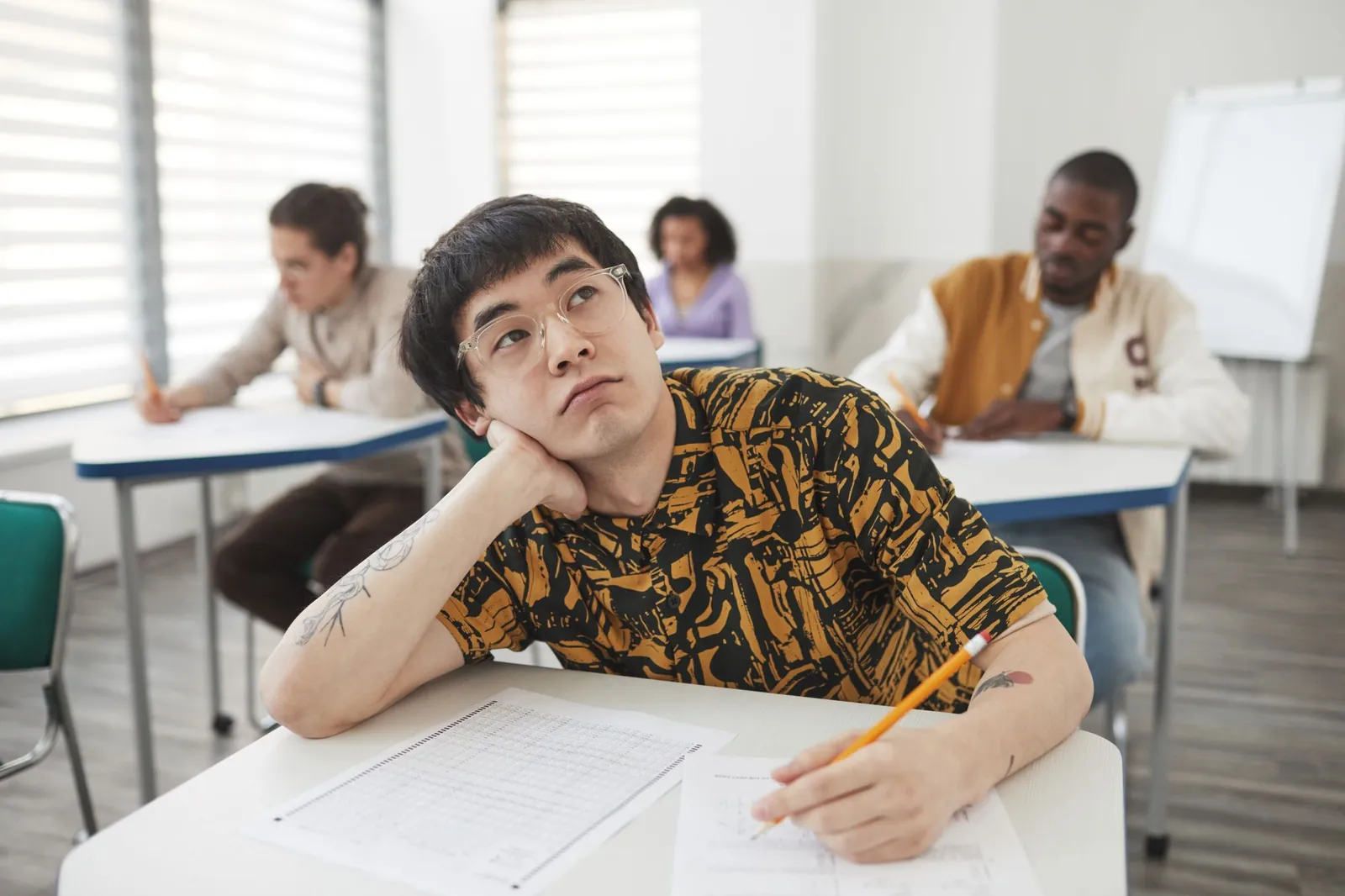 Adult candidates sitting a written exam